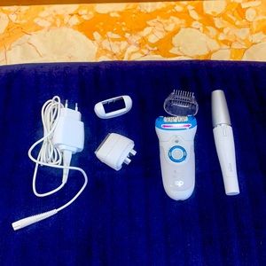 Braun silk epilator 9 with facial hair removal